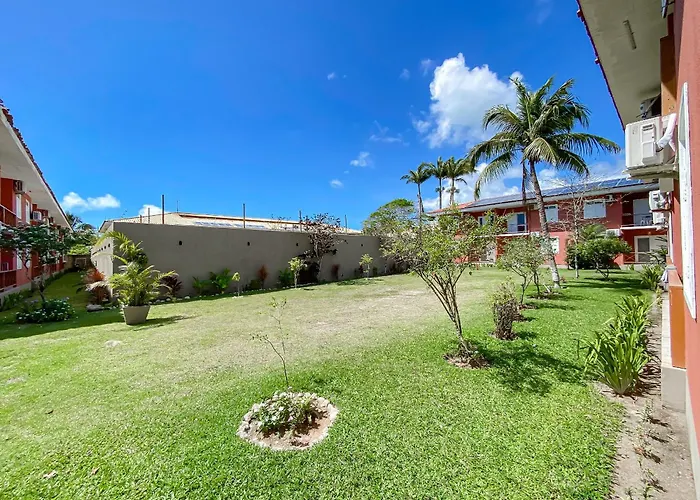 Flat frente praia de Taperapuã, atravessou a rua está na praia, com piscina, sauna e café da manhã como cortesia Porto Seguro